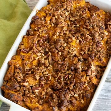 A 9x13 casserole dish filled with gf pumpkin french toast.