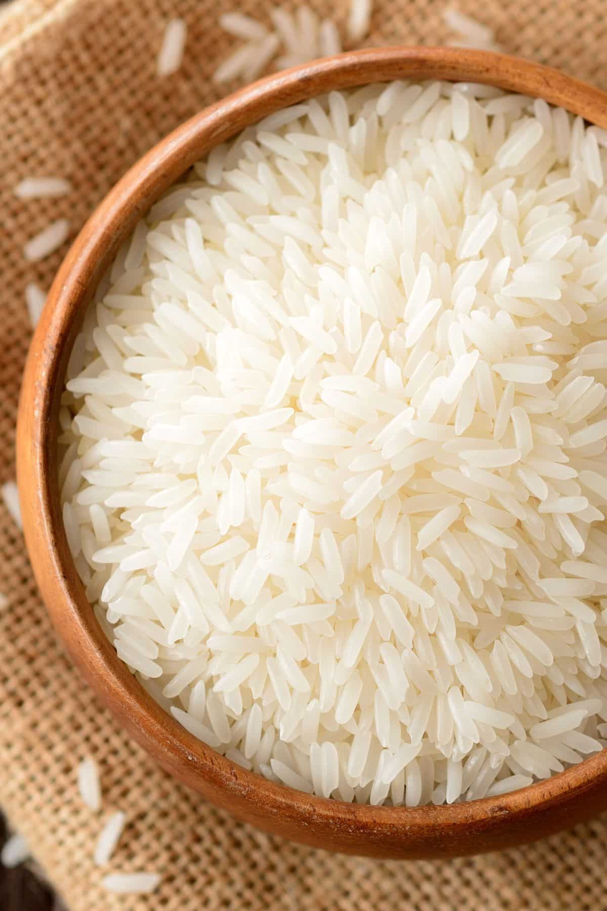 A bowl of uncooked white rice.