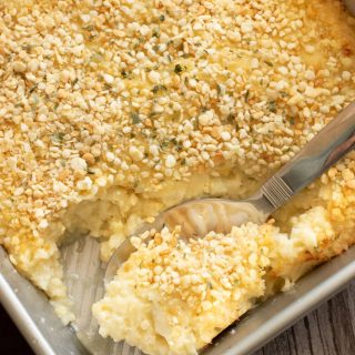 an 8x8 baking dish filled with mashed cauliflower.