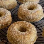 apple cider donuts on a rack.