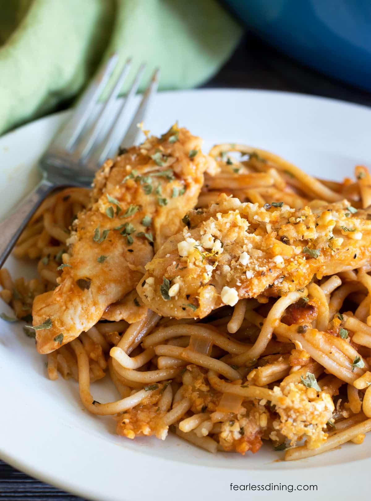 A close up of a plate of chicken spaghetti.