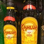 a pinterest image of the kahlua bottles