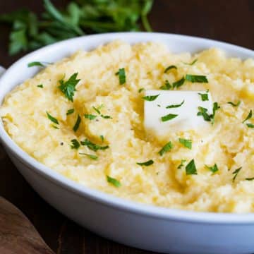 A casserole dish filled with mashed rutabagas.