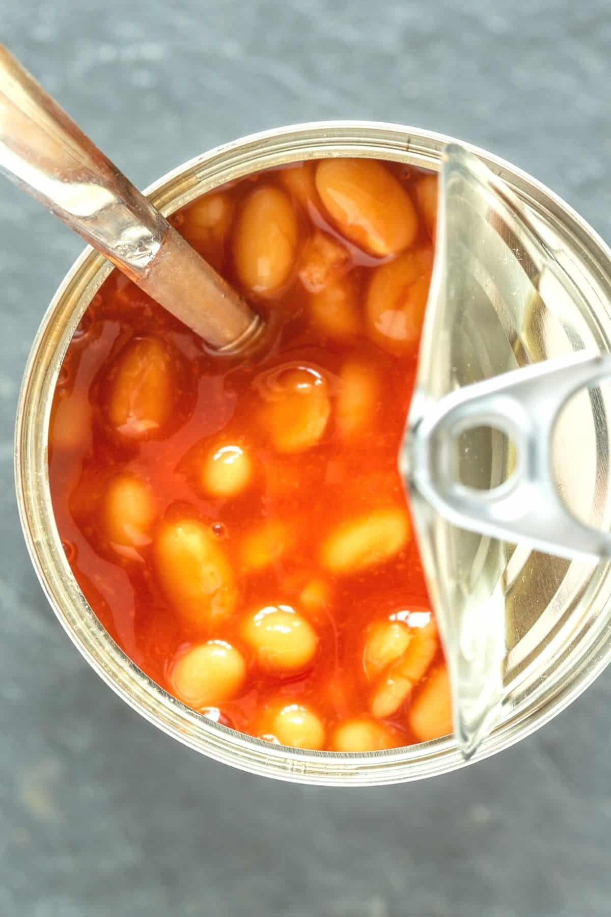 an open can of baked beans.