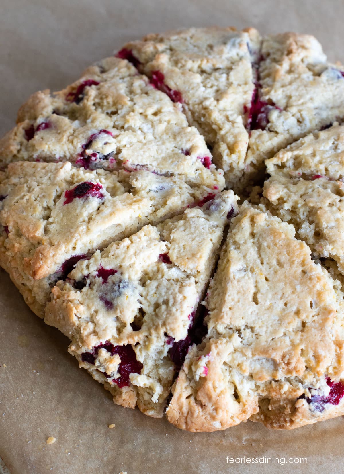 Baked scones on a cookie sheet.