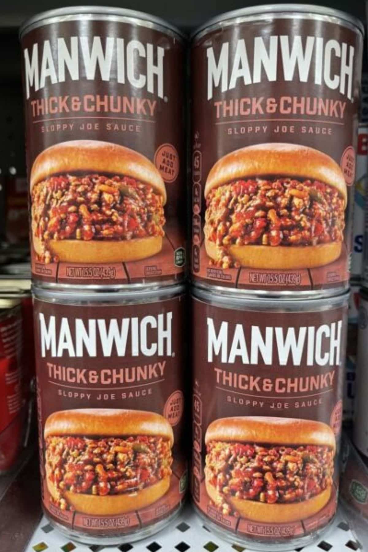 Jars of Manwich Sloppy Joe Sauce on the grocery shelf.