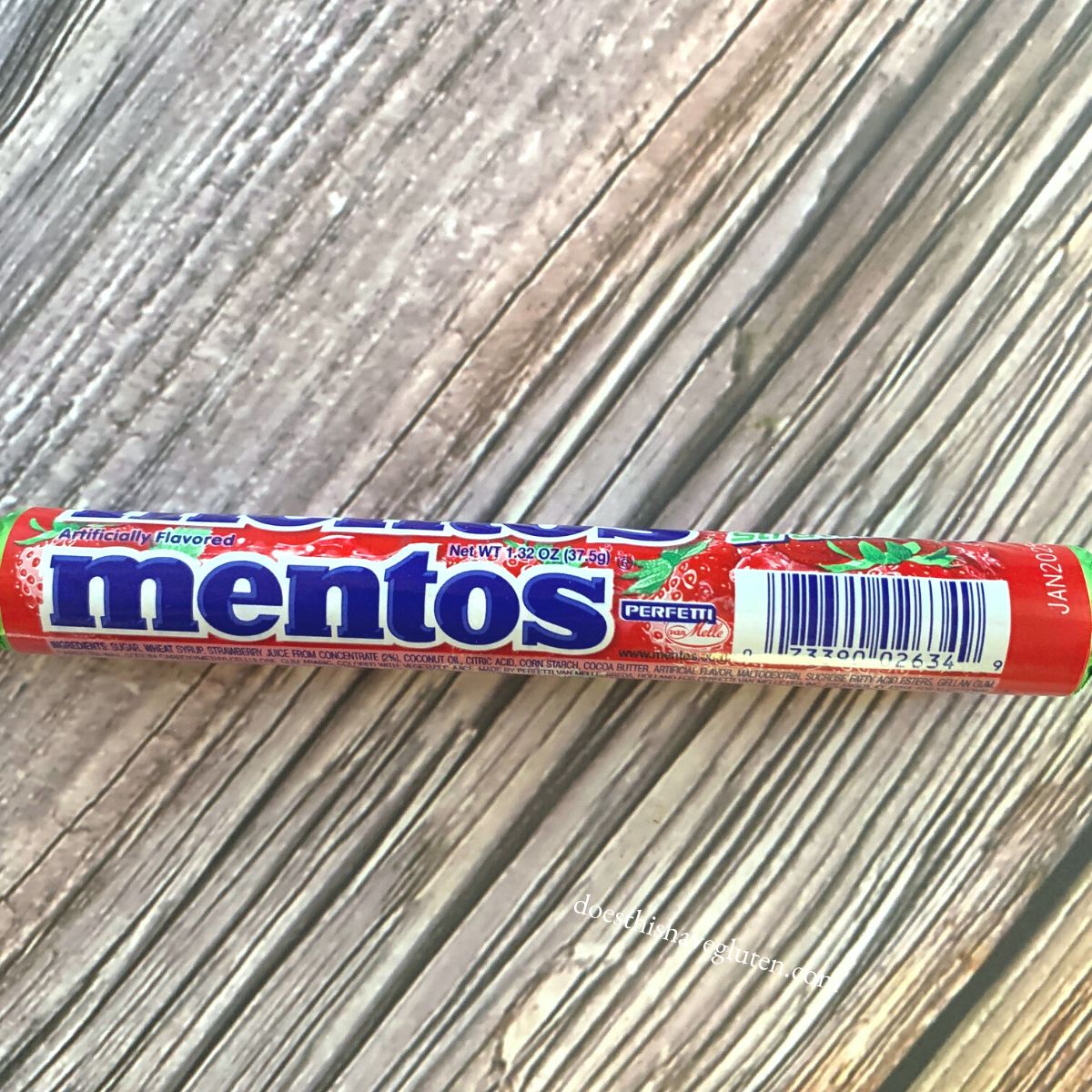 A roll of fruit mentos on a table.