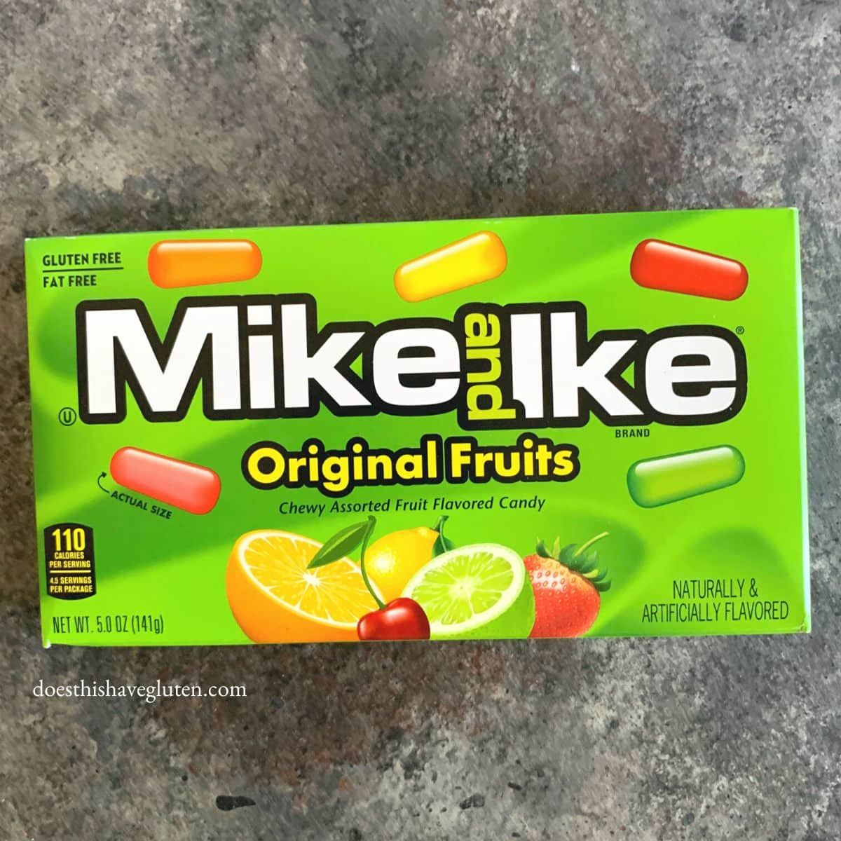 A box of mike and ike candy on the counter.