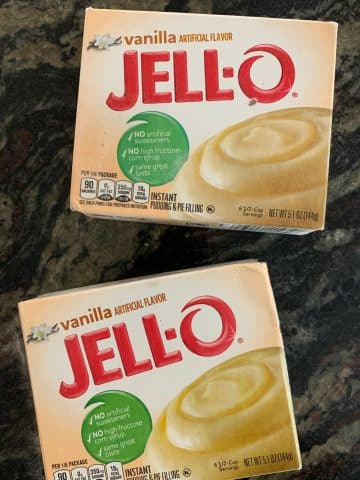 Two boxes of vanilla jello pudding.