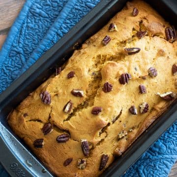 A baked gluten free sweet potato cake in a loaf pan.