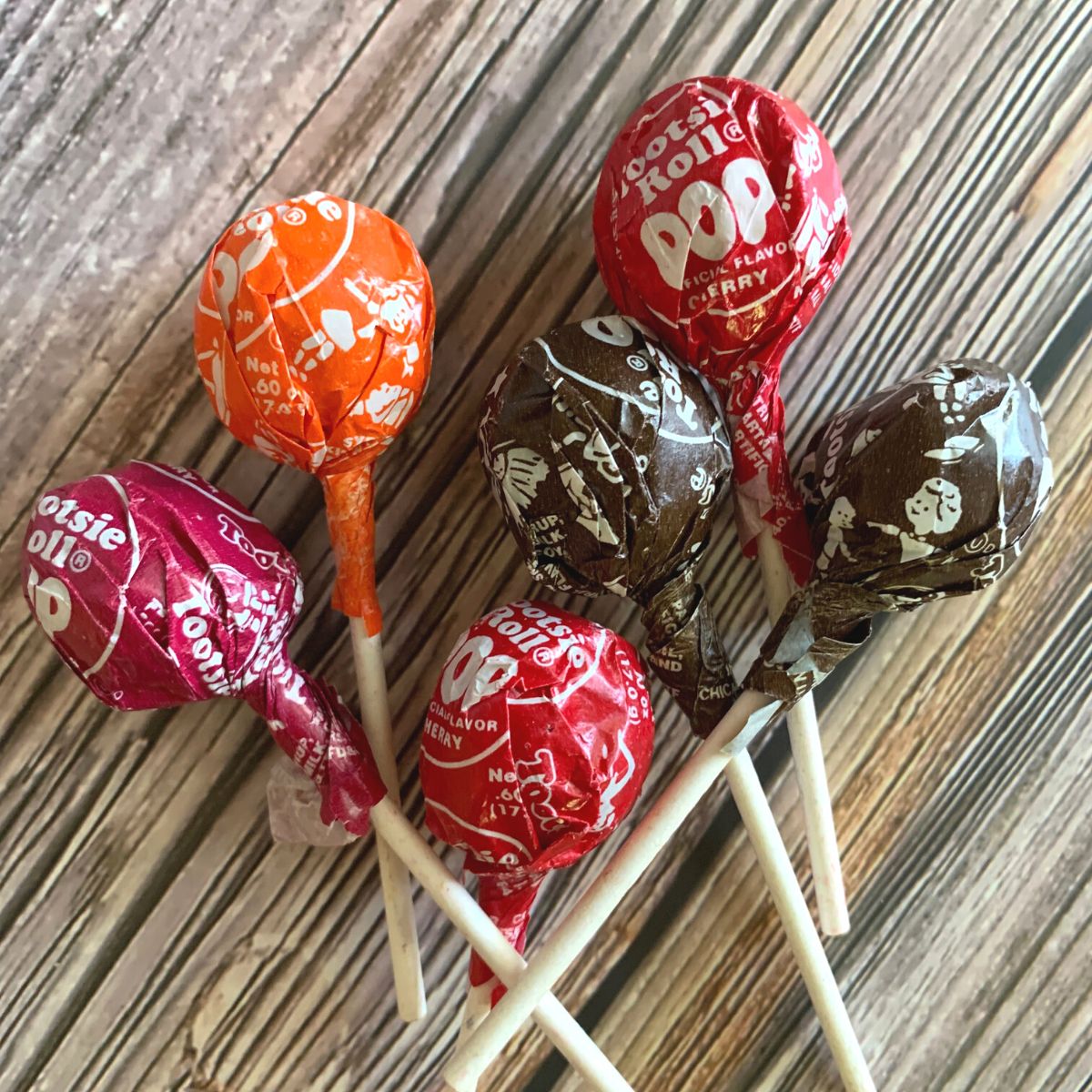 Tootsie pops on a table.