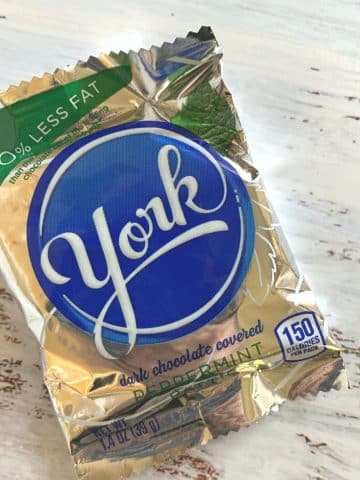 A york peppermint patty in its packaging on the table.