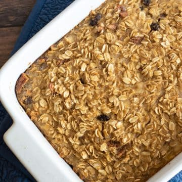 A casserole dish filled with gluten free baked oatmeal with bananas.