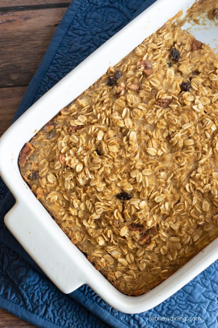 A casserole dish filled with gluten free baked oatmeal with bananas.