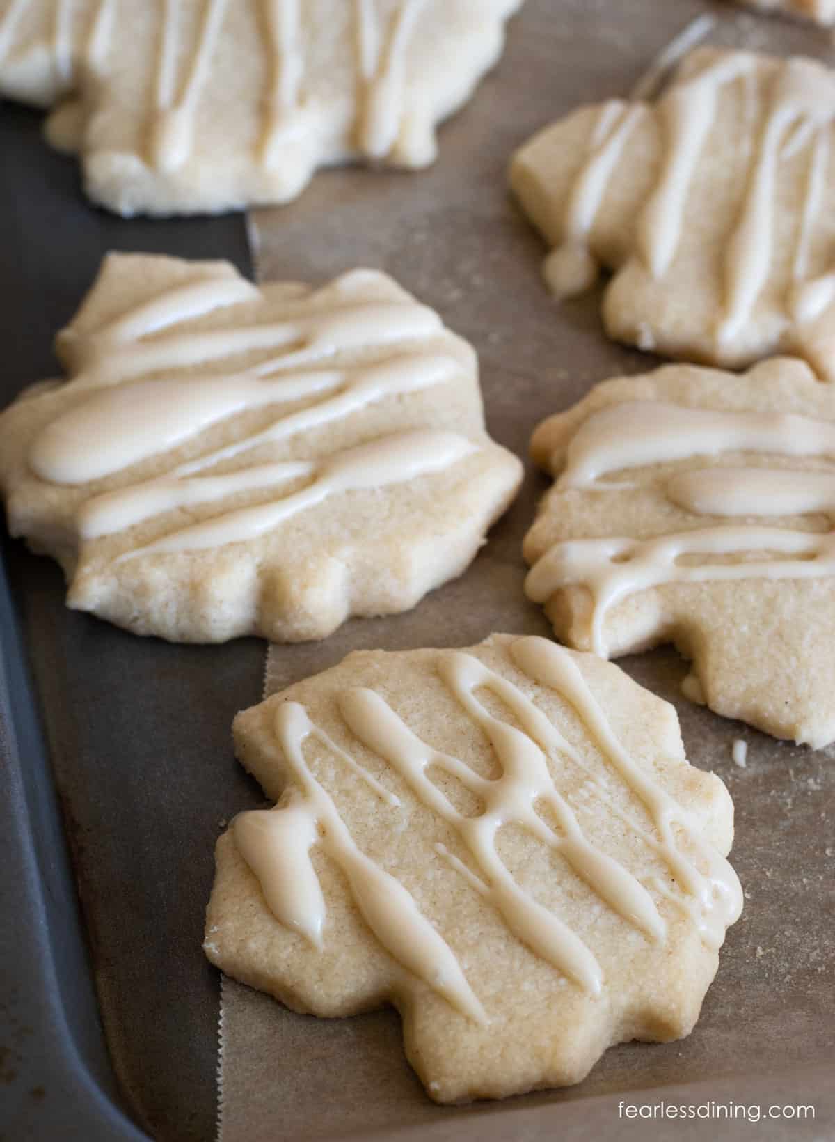 Iced maple shortbread cut in leaves.