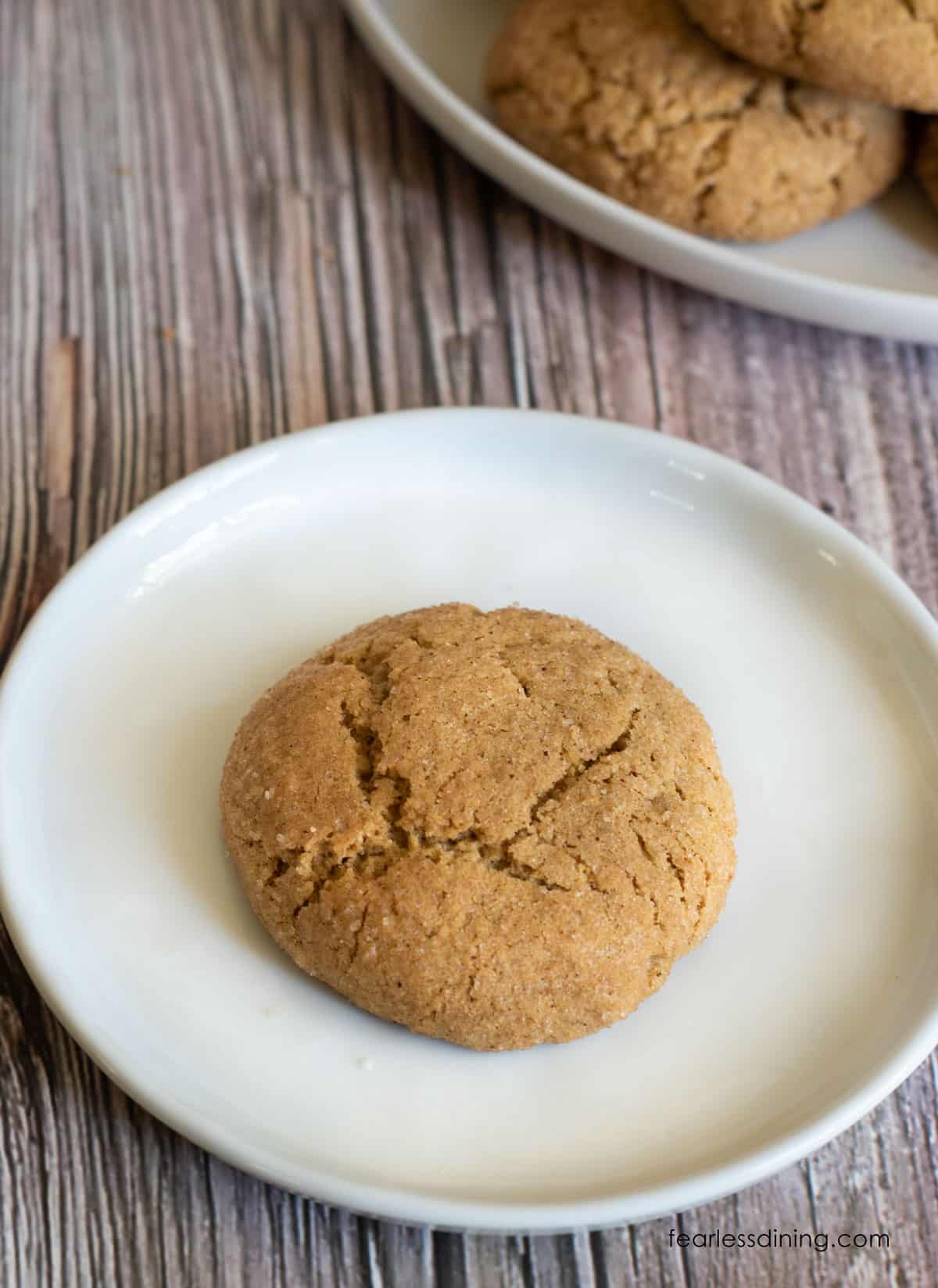 A gluten free chai snickerdoodle on a small white plate.
