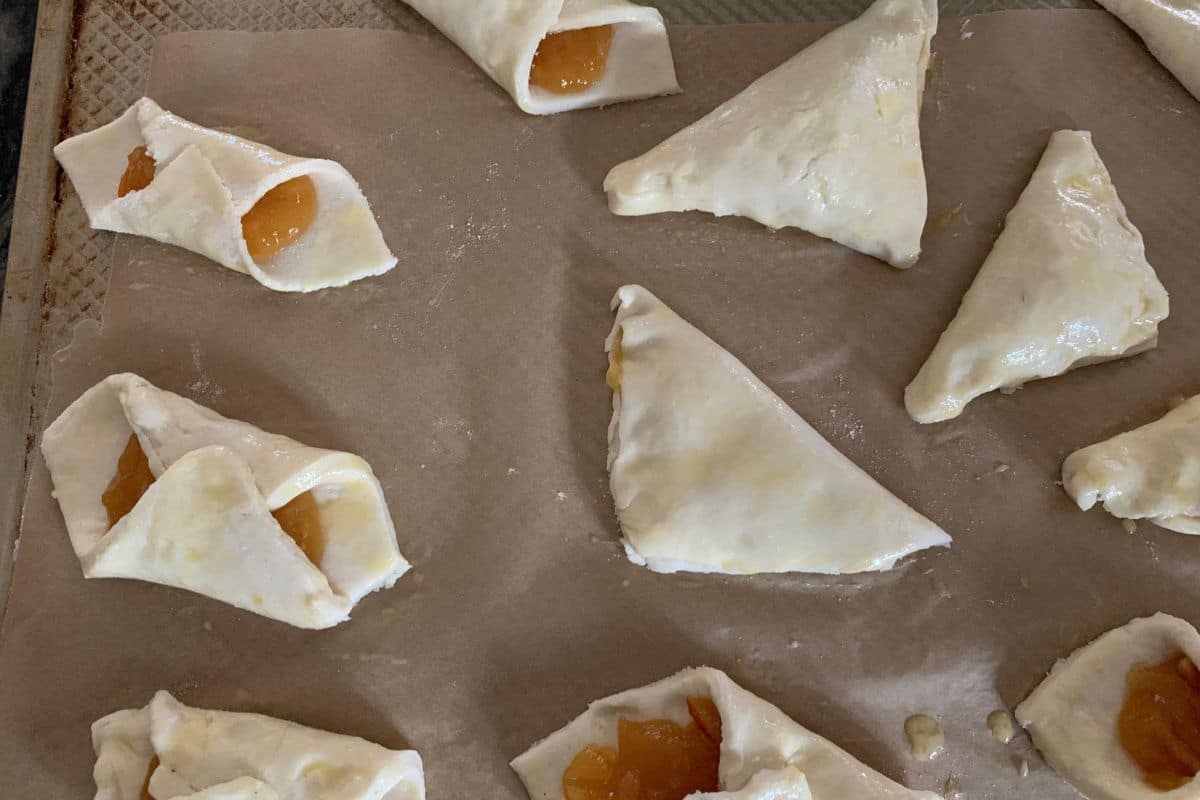 Filled pastries ready to bake.