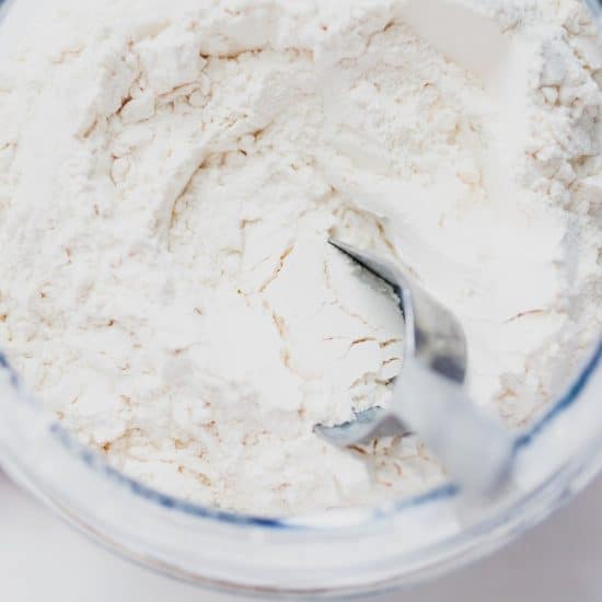 A glass bowl filled with my gluten free flour blend.