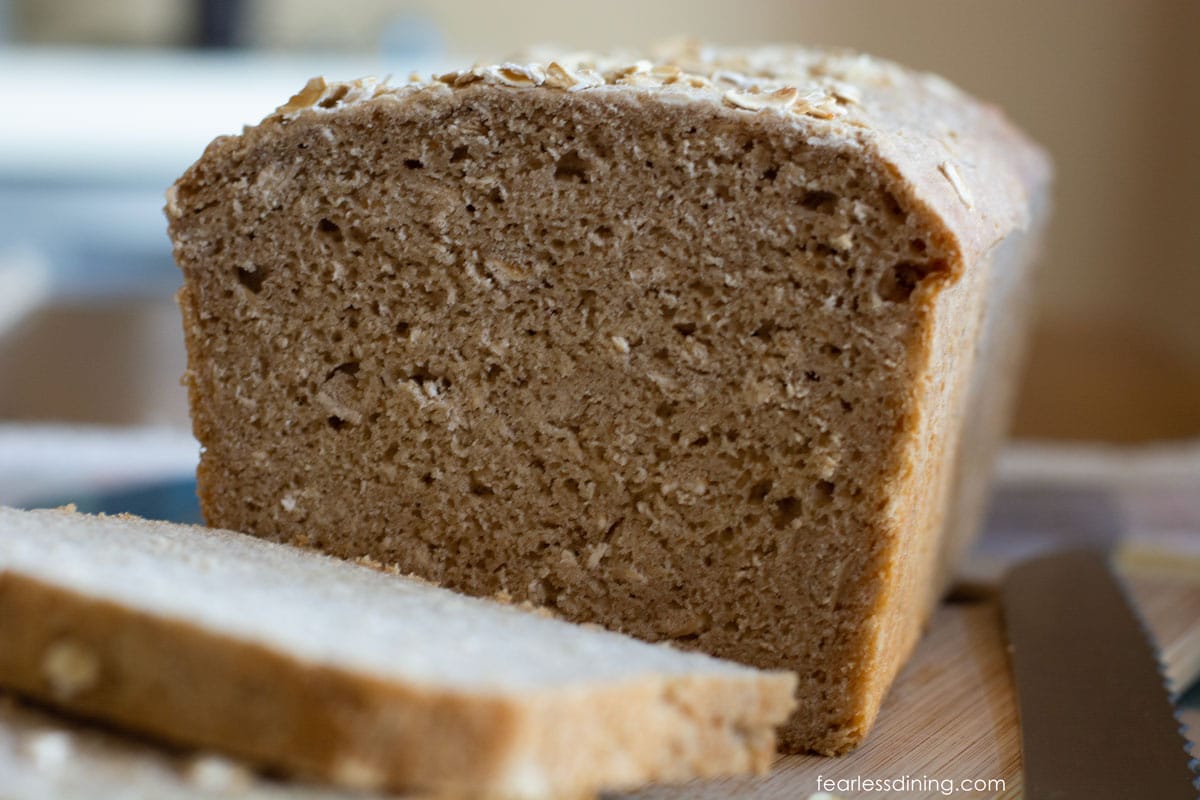 A close up photo of the loaf of oat bread.
