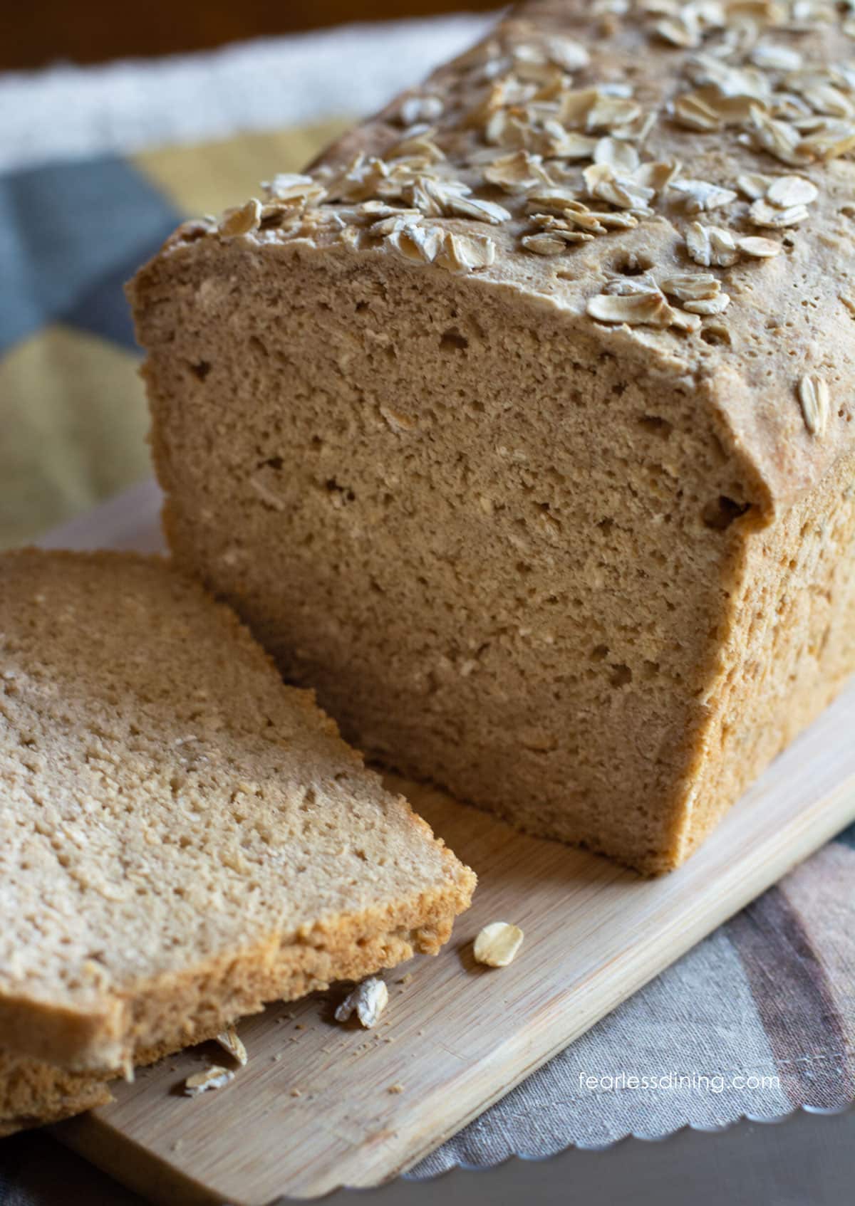 Gluten free oat bread sliced so you can see the inside.