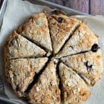 Baked gluten free oat scones on a baking sheet.