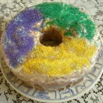 A gluten free king cake on a plate.