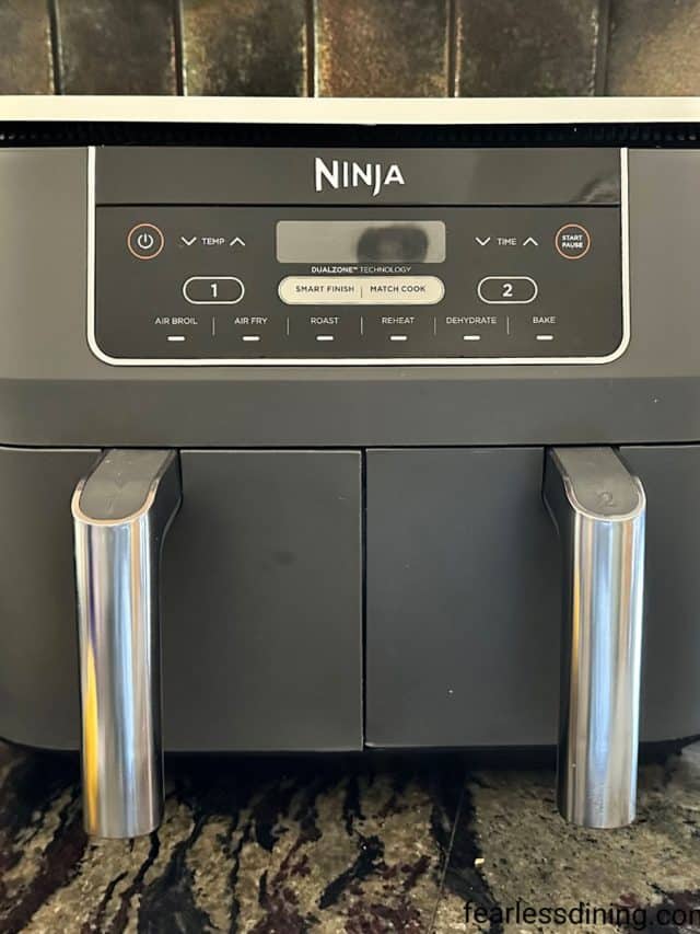 A photo of my Ninja Foodie Dual Zone Air Fryer on my kitchen counter.