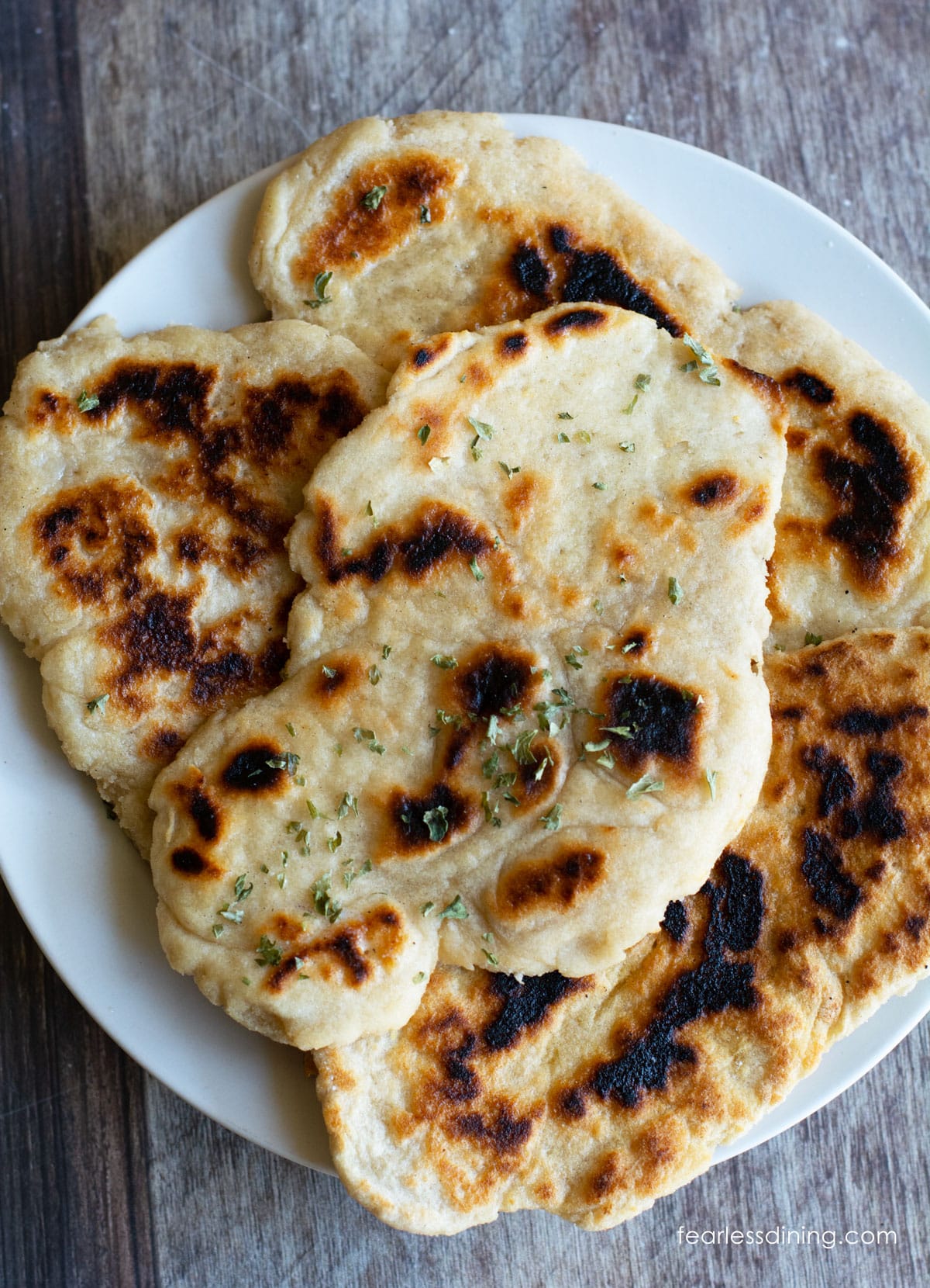 A plate full of gluten free naan made with my DIY gluten free flour blend.