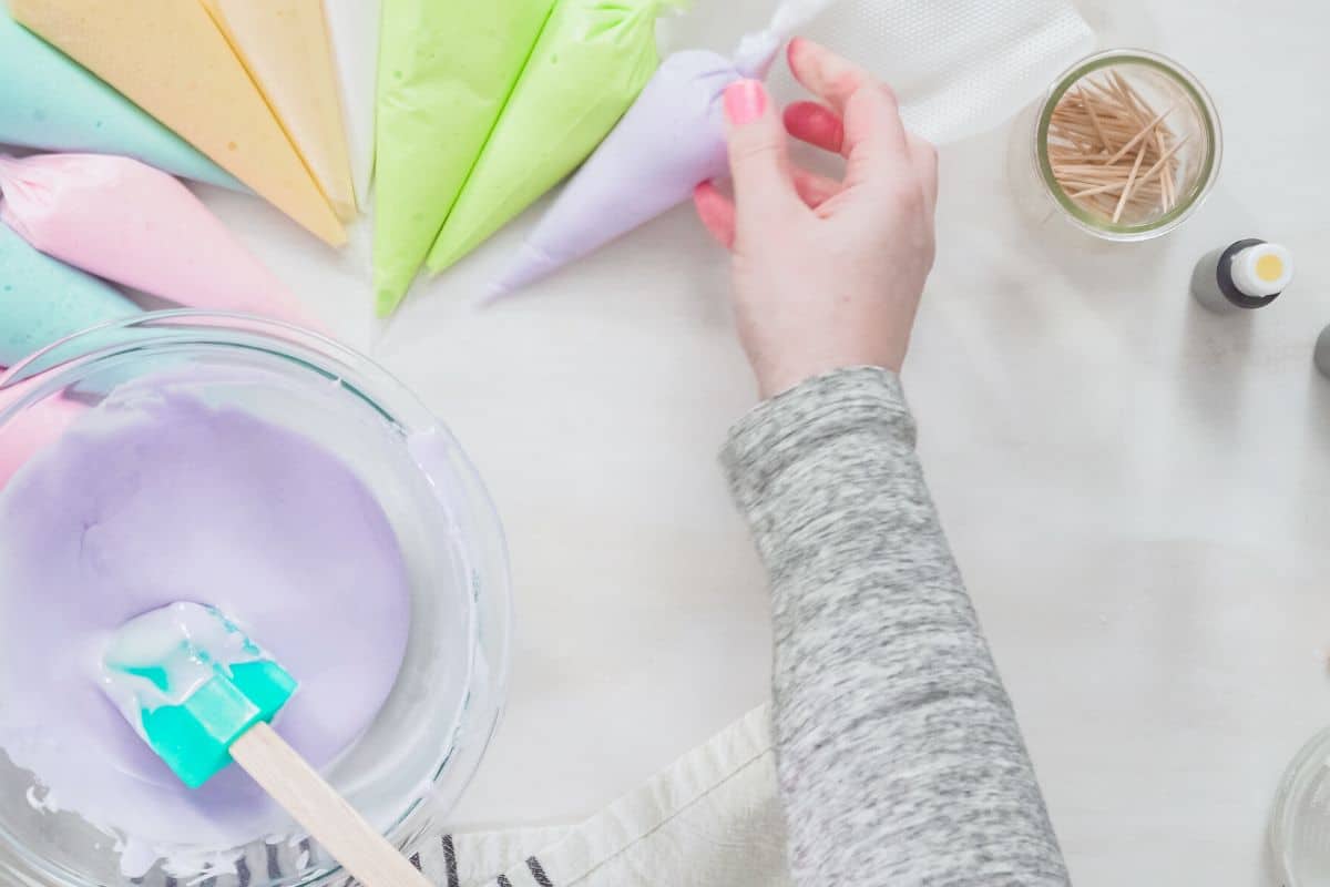 Getting the colored royal icing in piping bags.