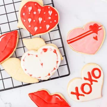 Decorated heart shaped gluten free sugar cut out cookies for Valentine's Day.