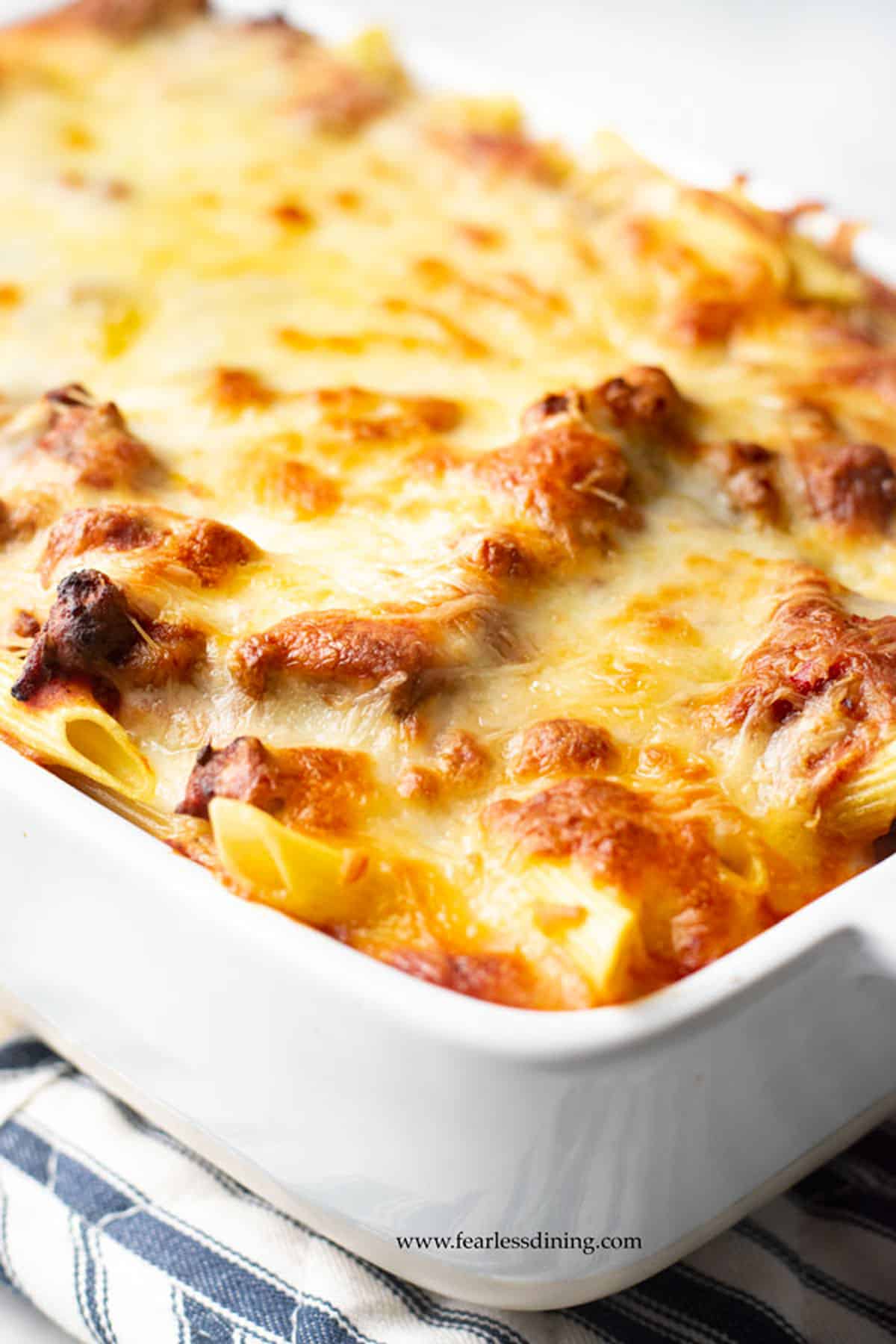 A gluten free baked ziti in a casserole dish.