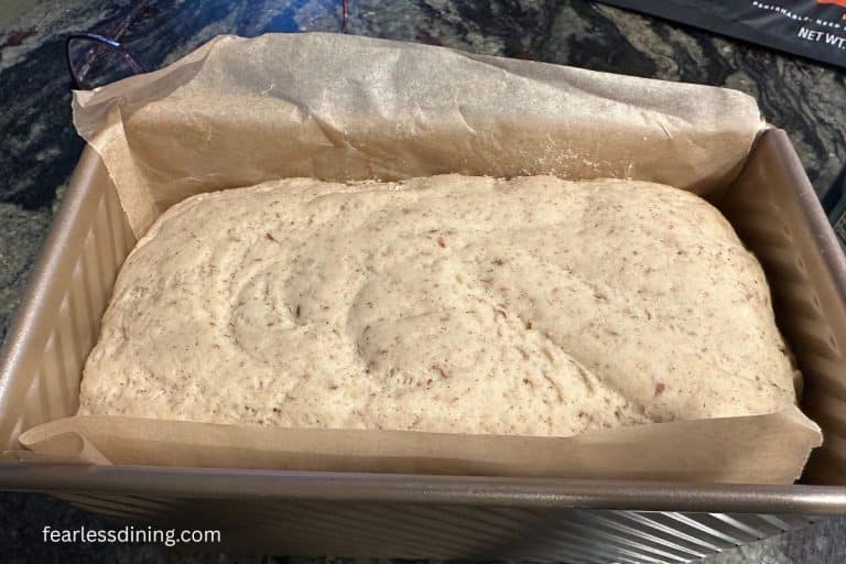 Gluten-free bread dough in a pullman loaf pan.