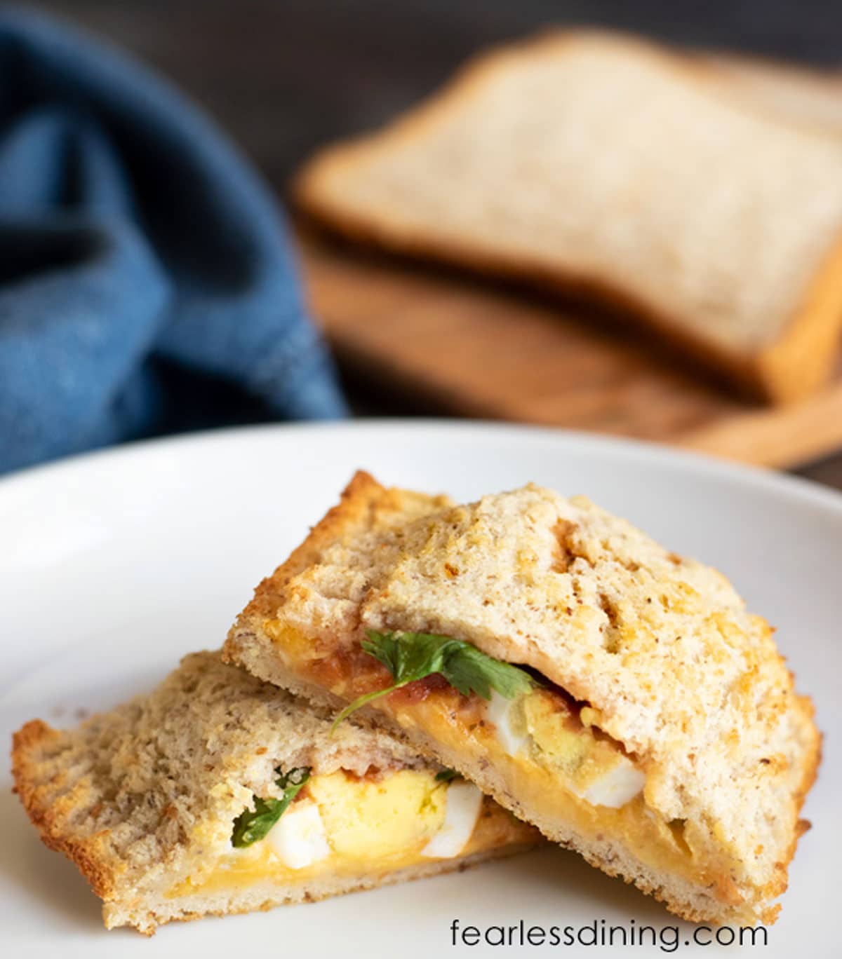 A gluten free hot pocket cut in half so you can see the fillings.