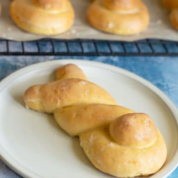 A gluten free orange roll shaped like bunny butts for Easter.