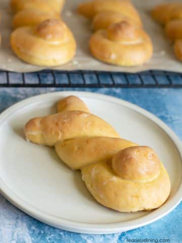 A gluten free orange roll shaped like bunny butts for Easter.