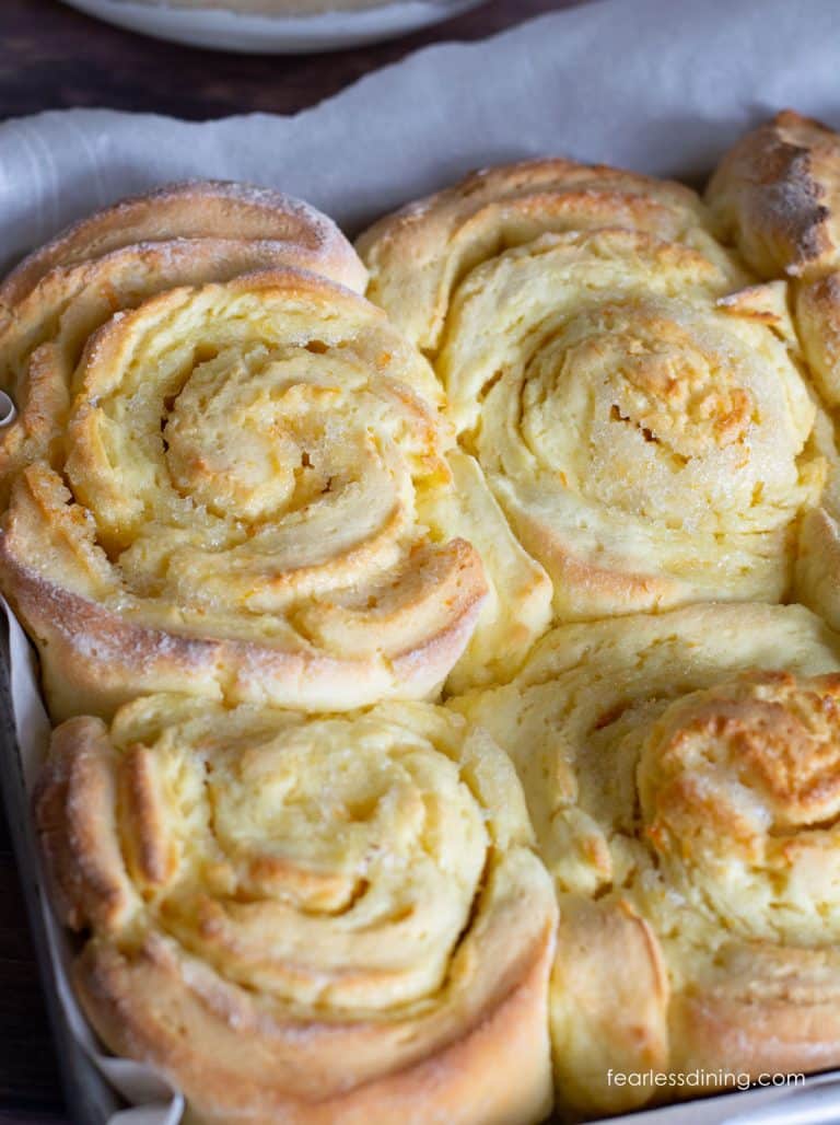 Gluten free orange rolls rolled like cinnamon rolls.