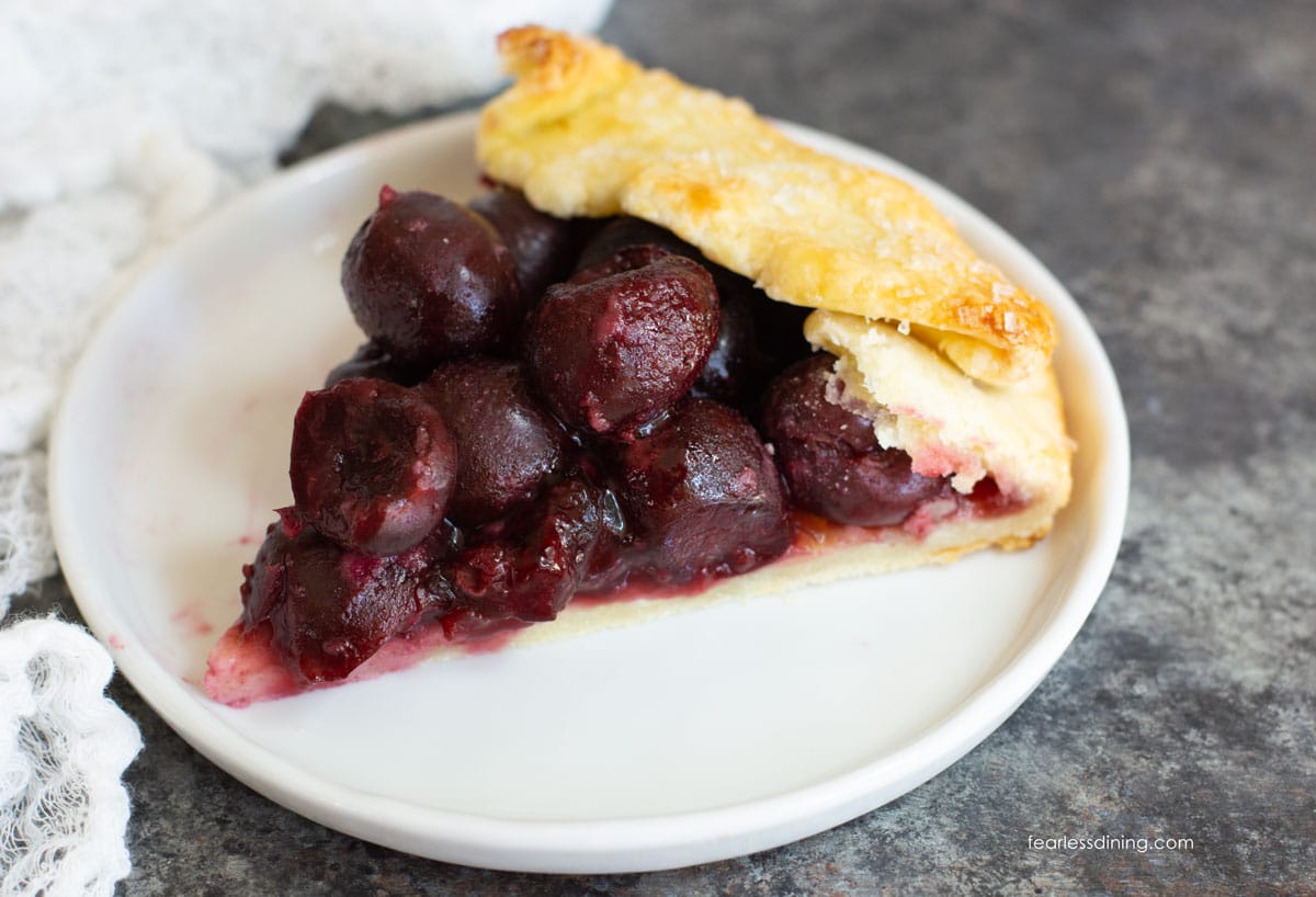 A slice of gluten free galette on a plate.