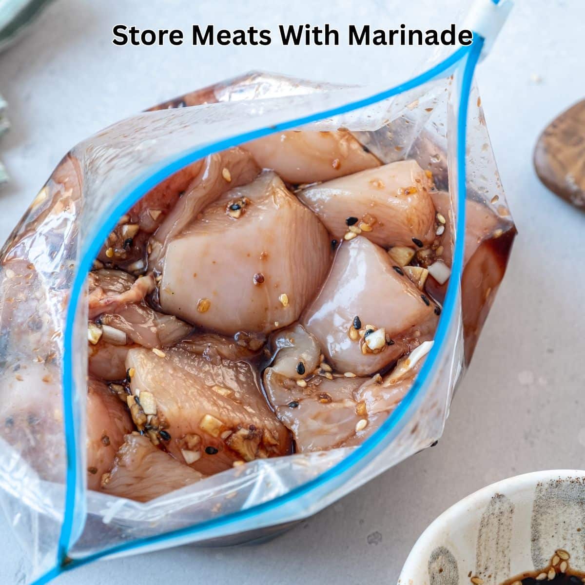 Raw chicken stored in a freezer bag with gluten-free Asian marinade.