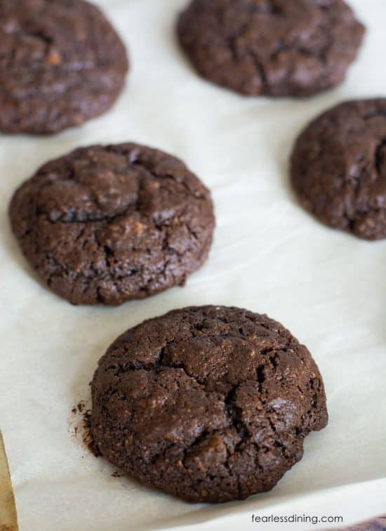 Baked gluten free cake mix cookies on a baking tray.