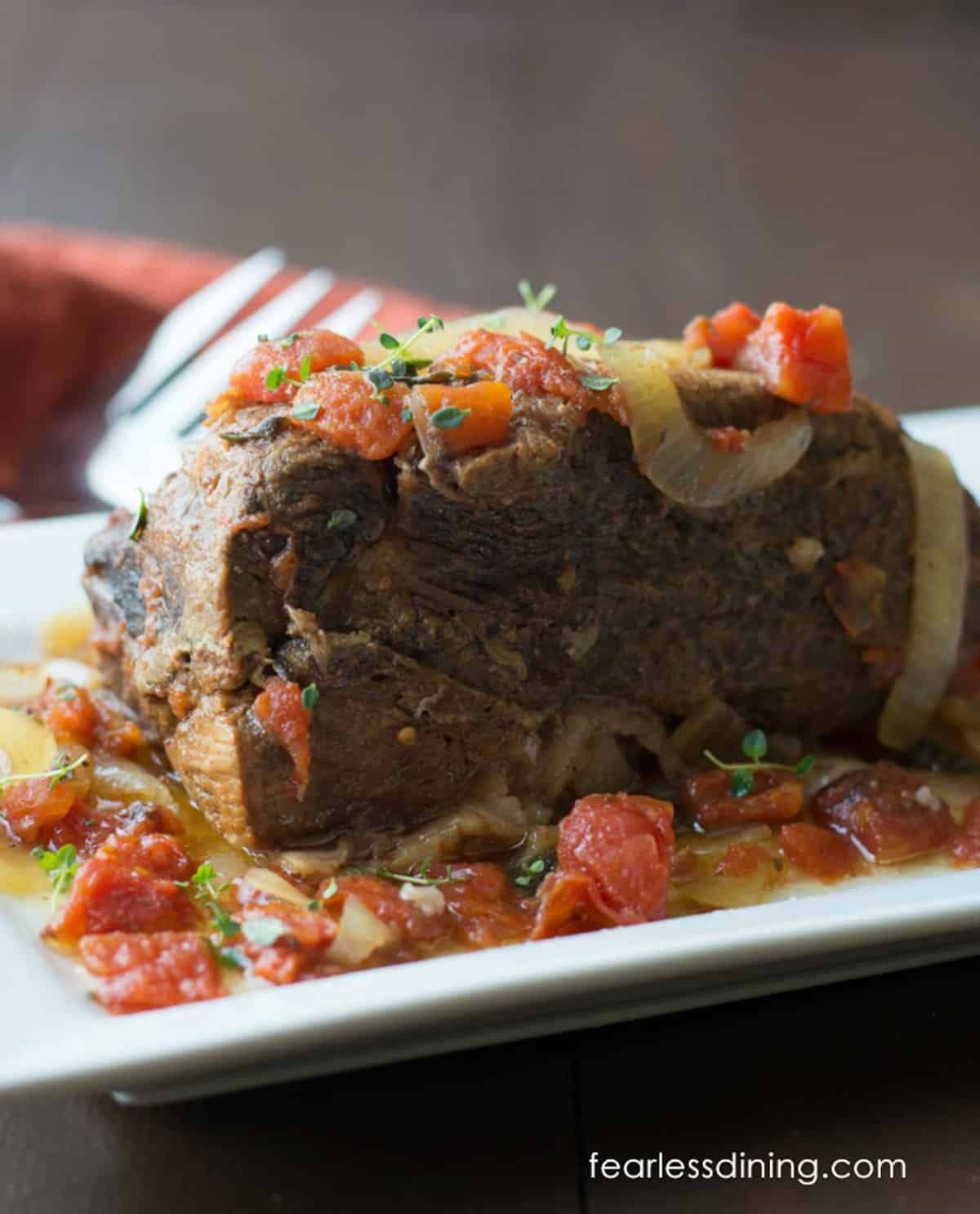 A slow cooked chuck roast on a platter.