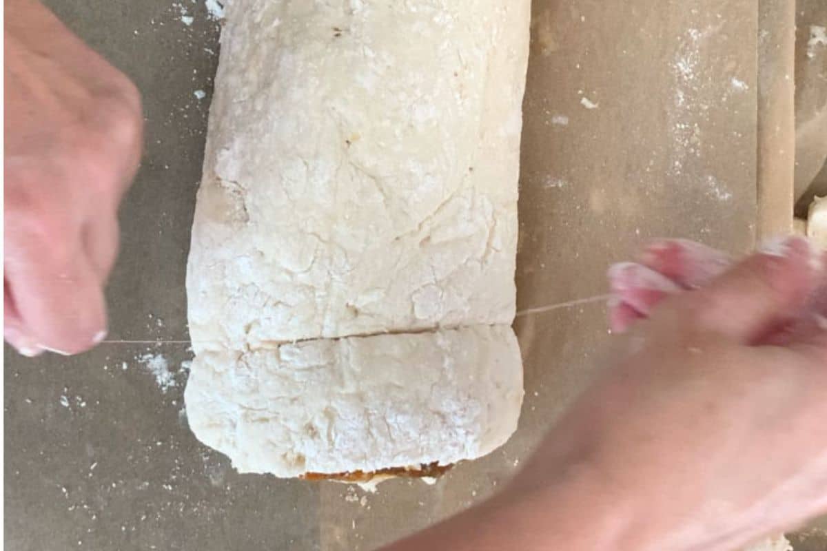 Using string to cut the nutella rolls from the log.