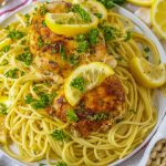Slow cooker chicken thighs over pasta.