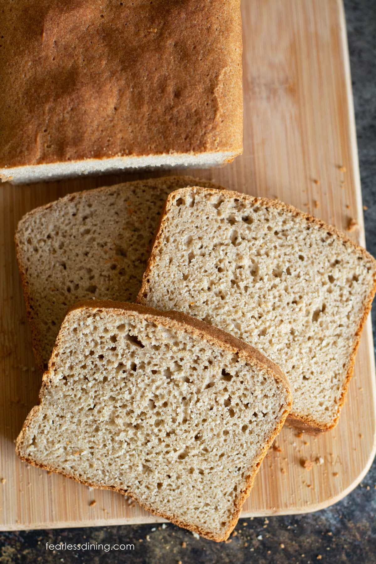 The top view of the sliced loaf of whole grain bread.