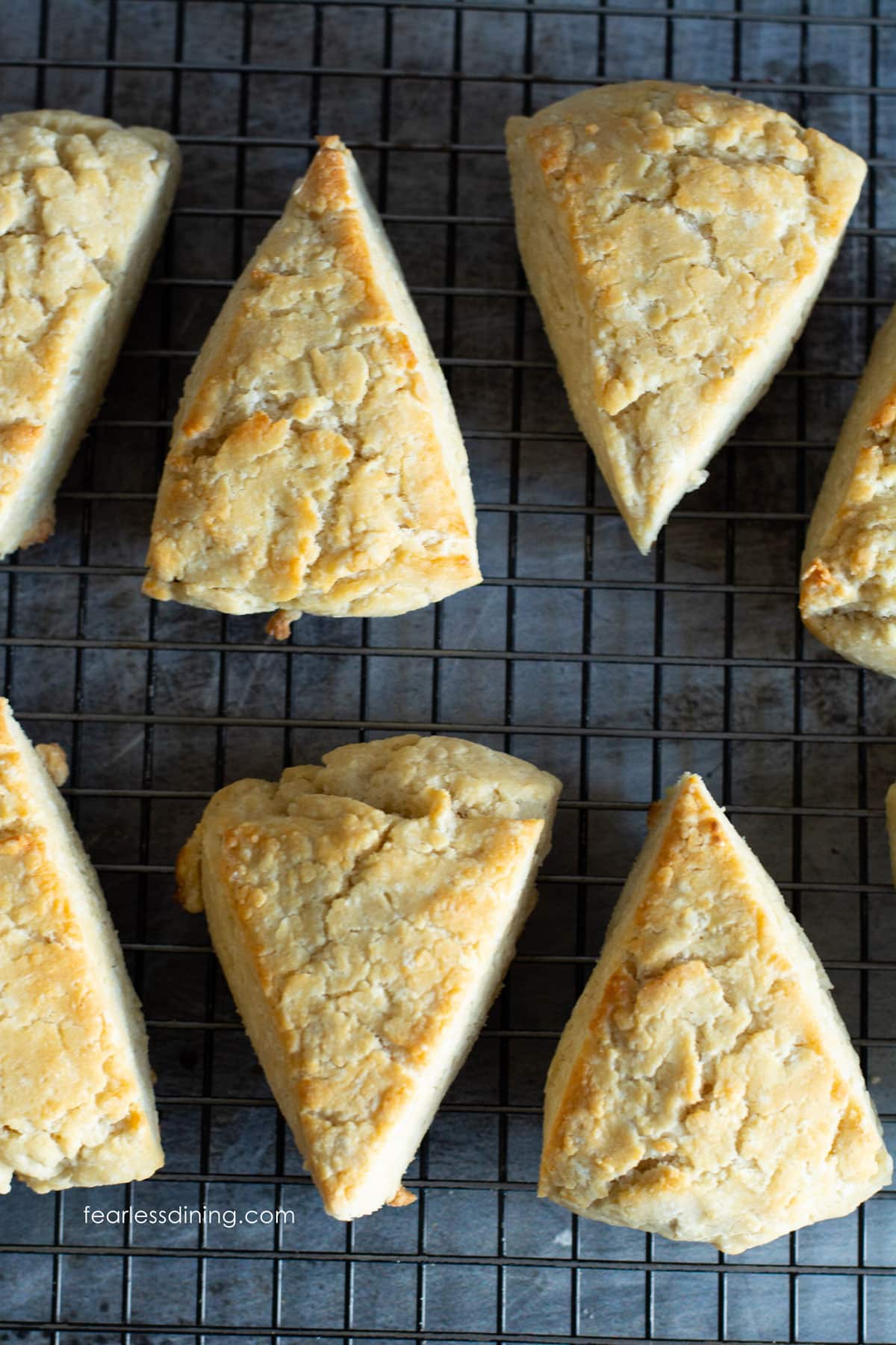 Gluten free buttermilk biscuits on a cooling rack.