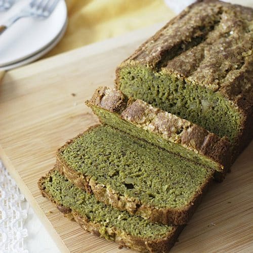 The top view of a sliced loaf of gluten-free matcha banana bread.