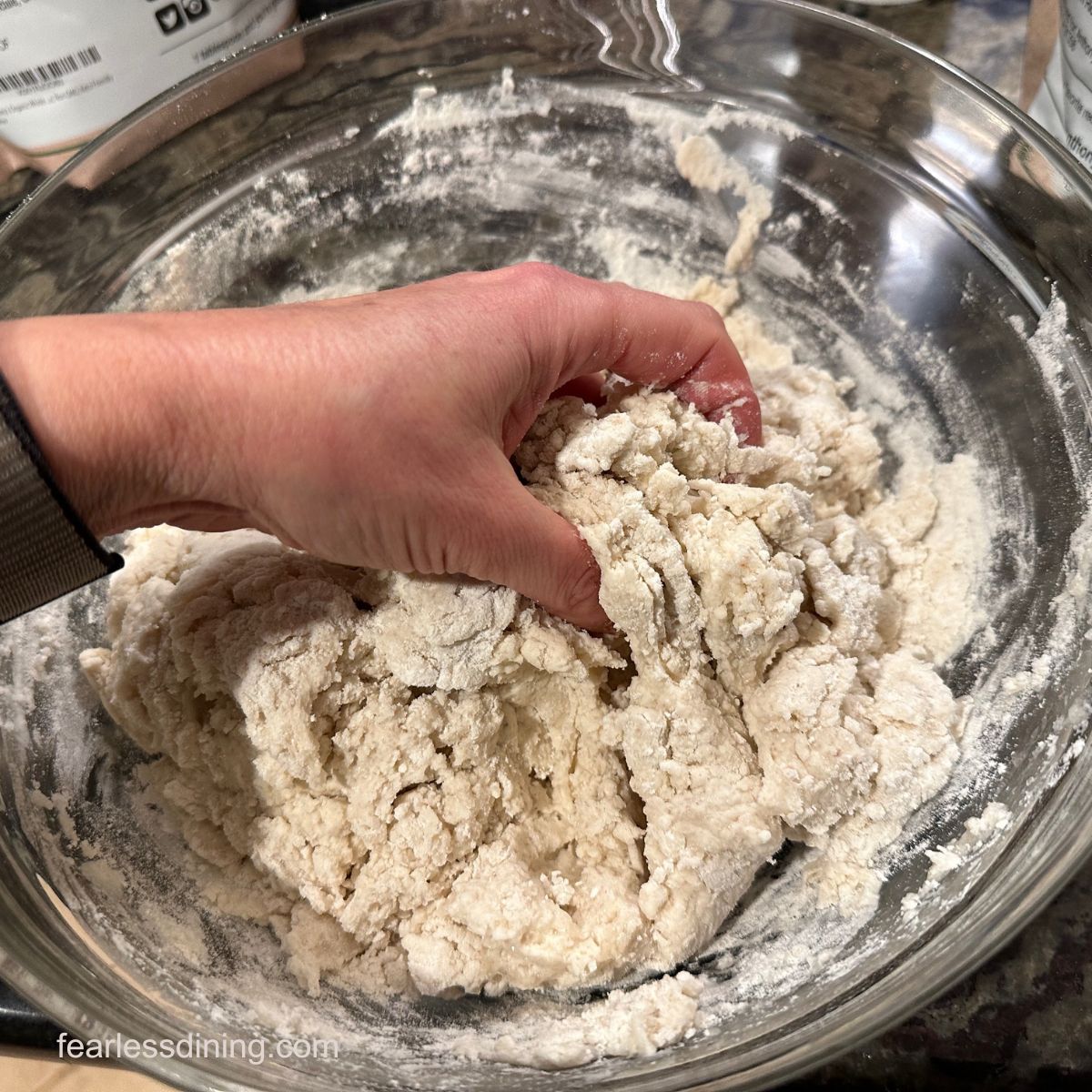 Mixing the bread dough by hand.