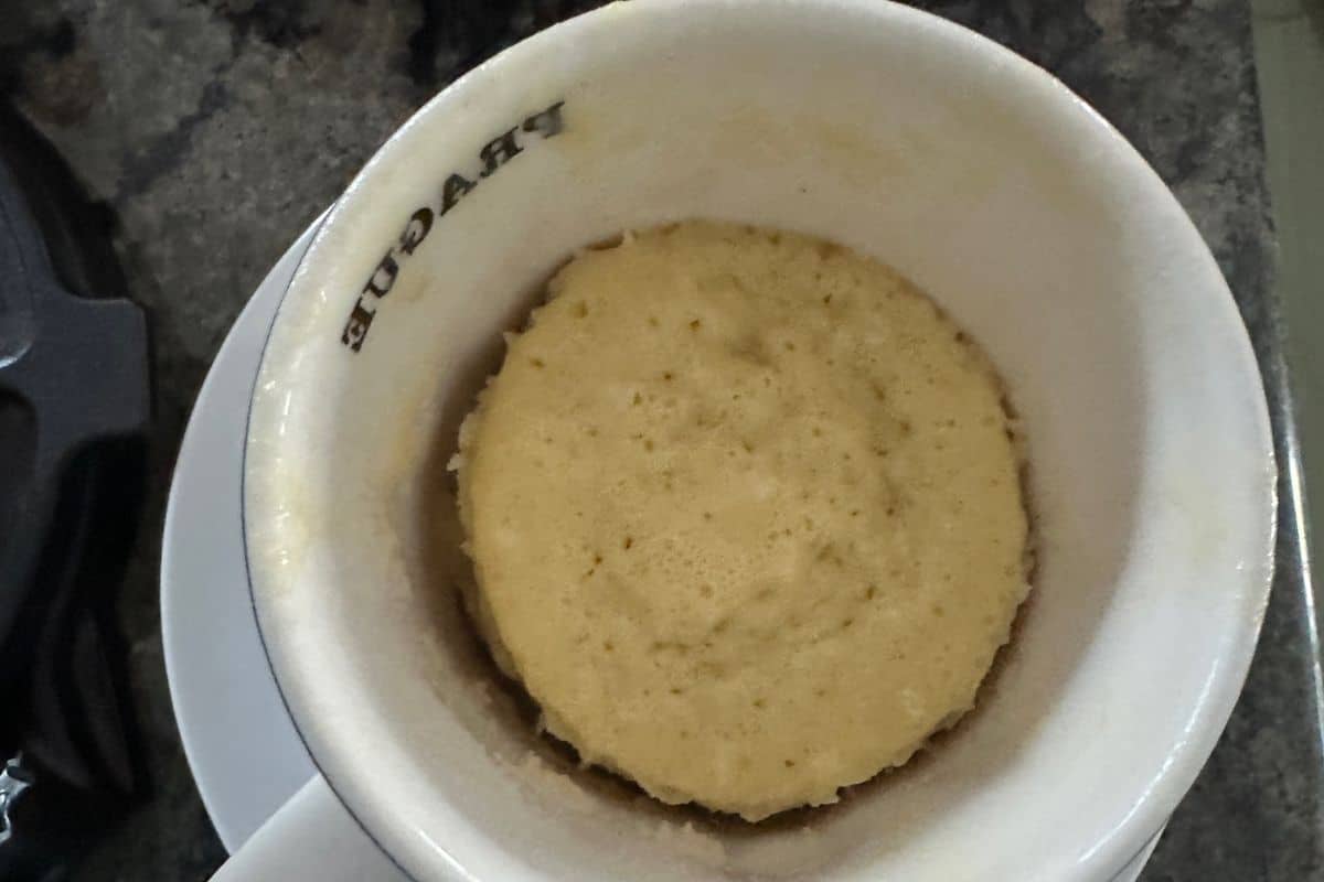 A cooked mug cake in the mug.