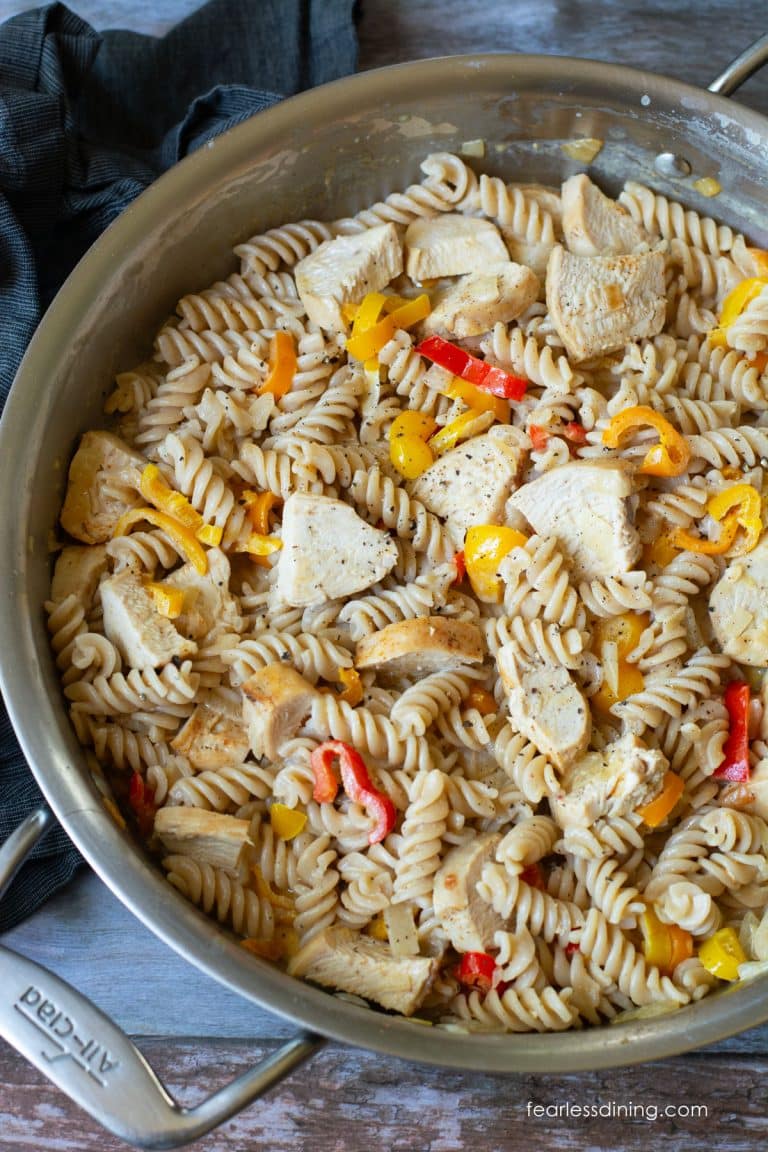 The cooked cajun chicken pasta in a large skillet.