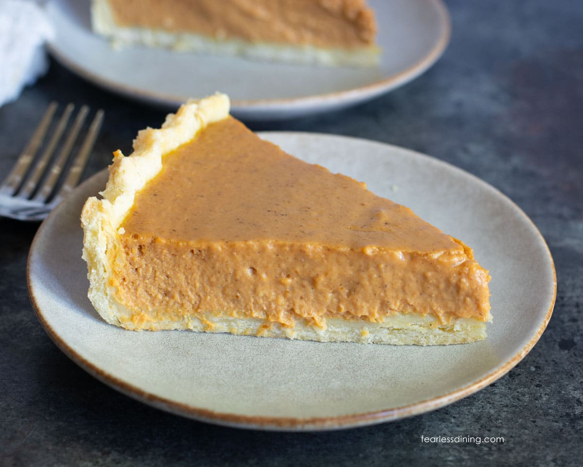 A close up of a slice of the gluten free pumpkin pie.