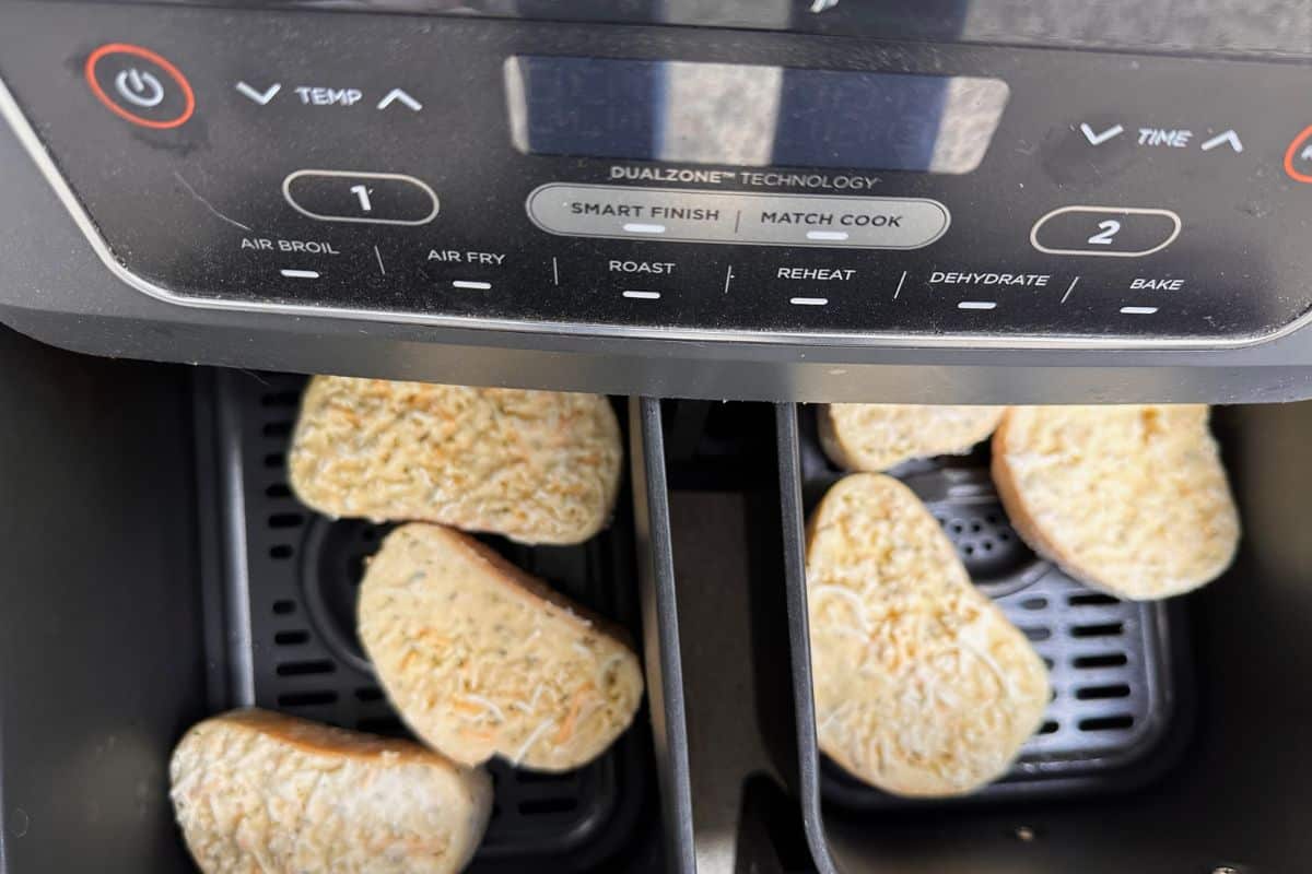 The frozen Texas toast in the air fryer, ready to cook.
